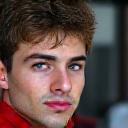 Portrait of a race driver with a helmet